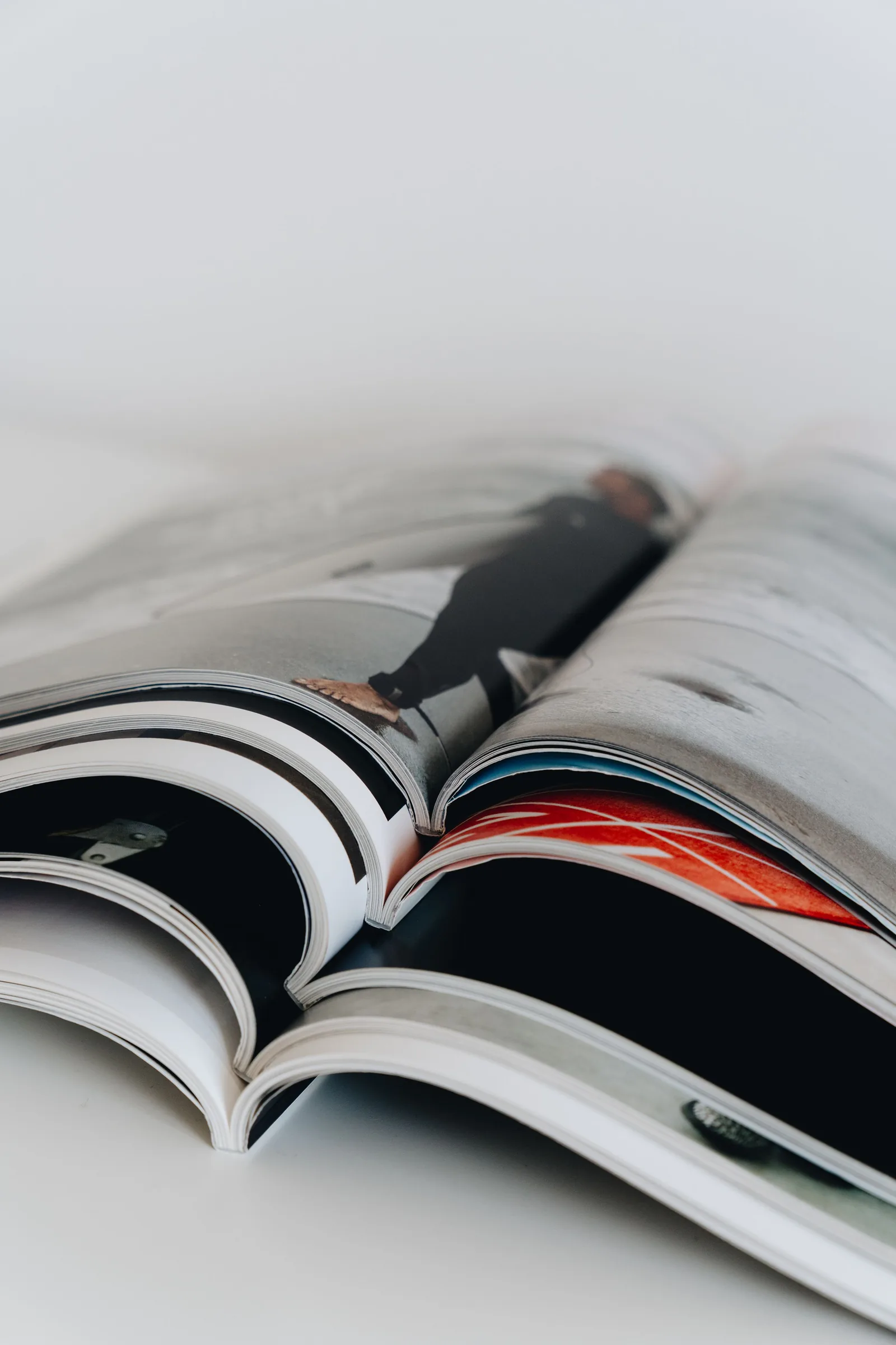 Open magazines spread on a table