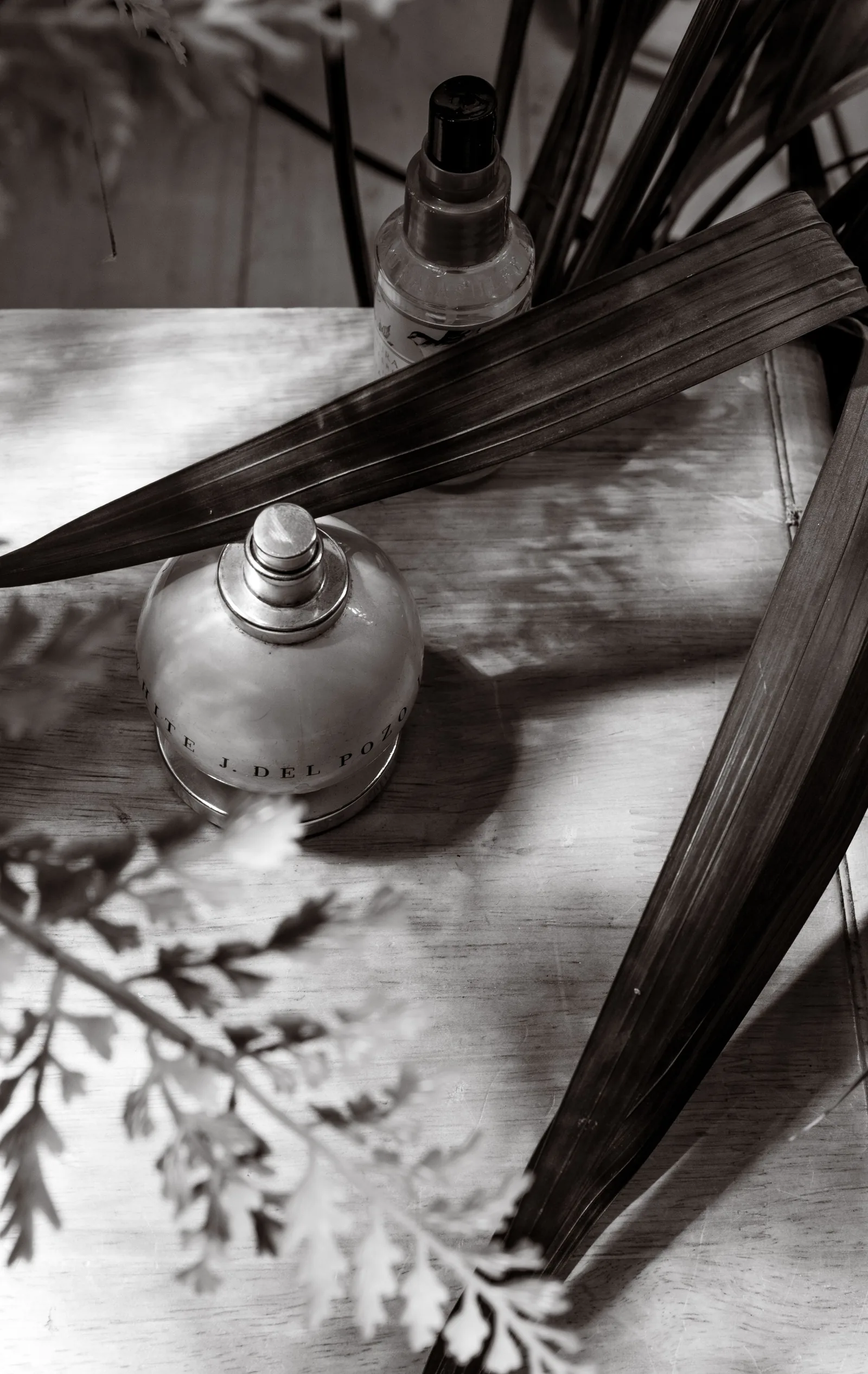 Perfume bottles on a table in soft light