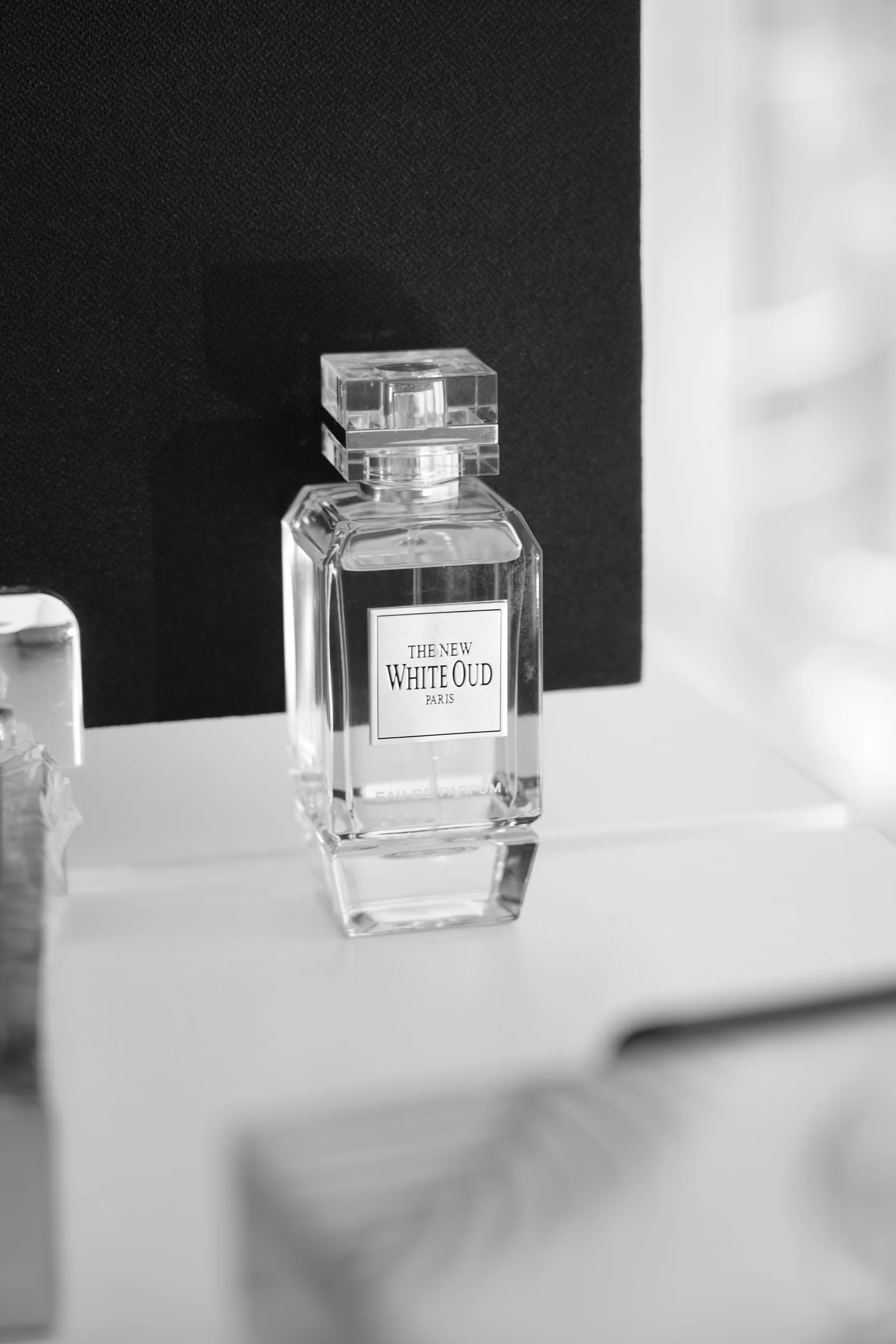 A small glass vial of perfume