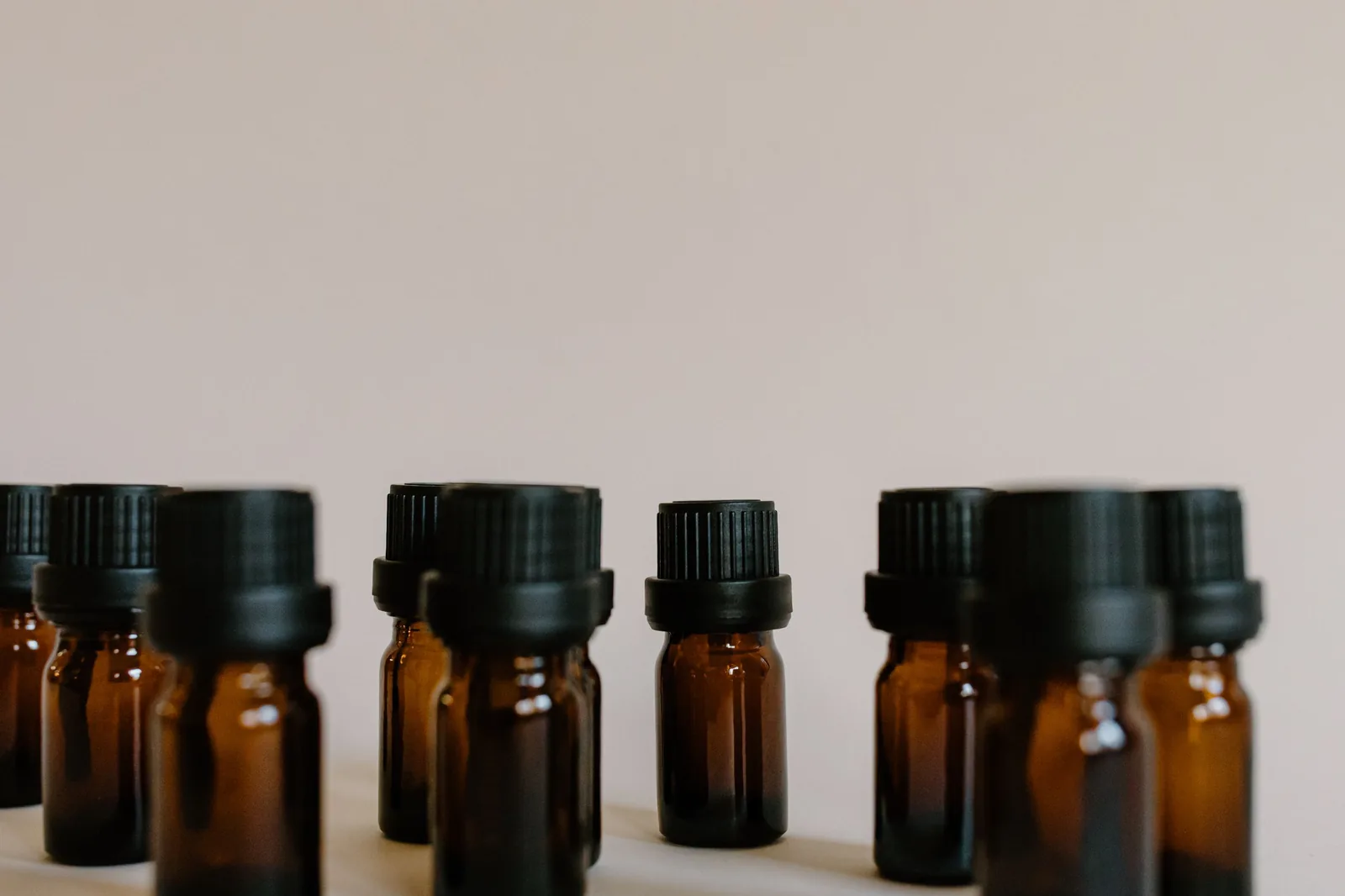 A row of brown glass bottles